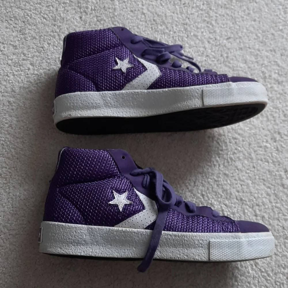 3 For $30. 24. Purple and white converse mid-top seankers.